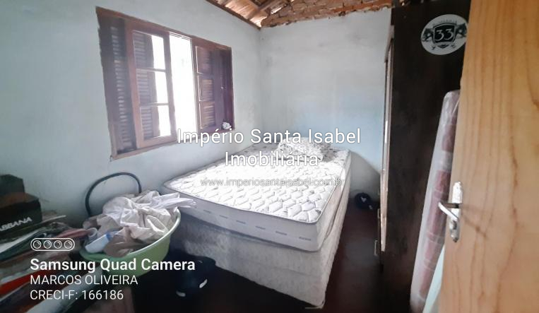 [Vende 3 casas em Santa Isabel SP na rua 7 de Setembro- tem escritura e]